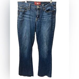 Lucky Brand- Boot Cut medium/dark wash jeans. Size 12. Excellent condition.